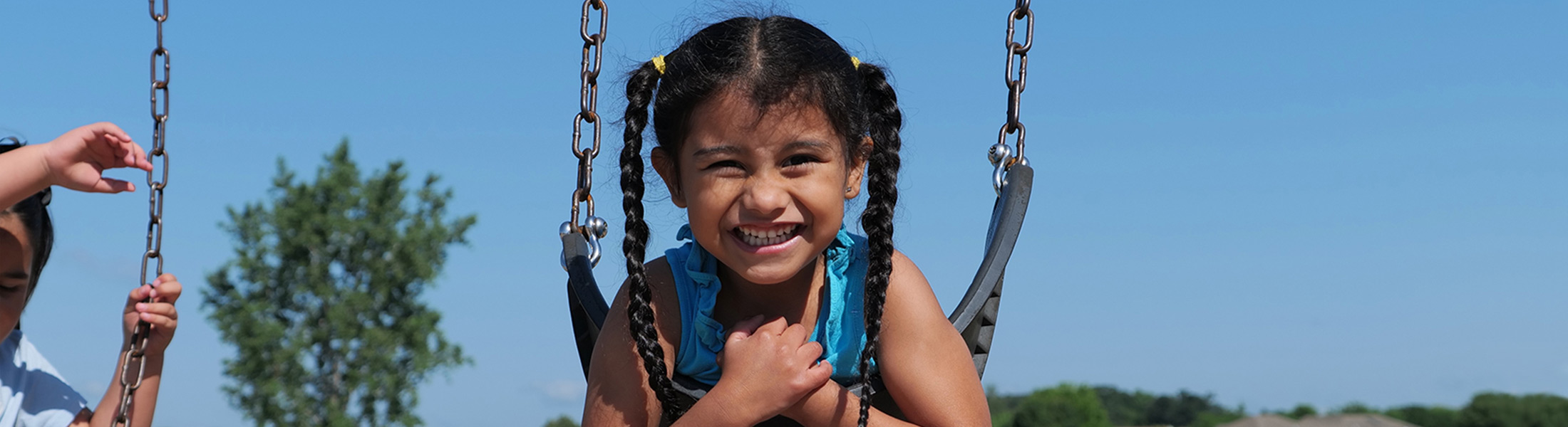 Group of students standing together in a hallway